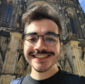 A picture of Eduardo in front of the St. Vitus Cathedral at Prague Castle.